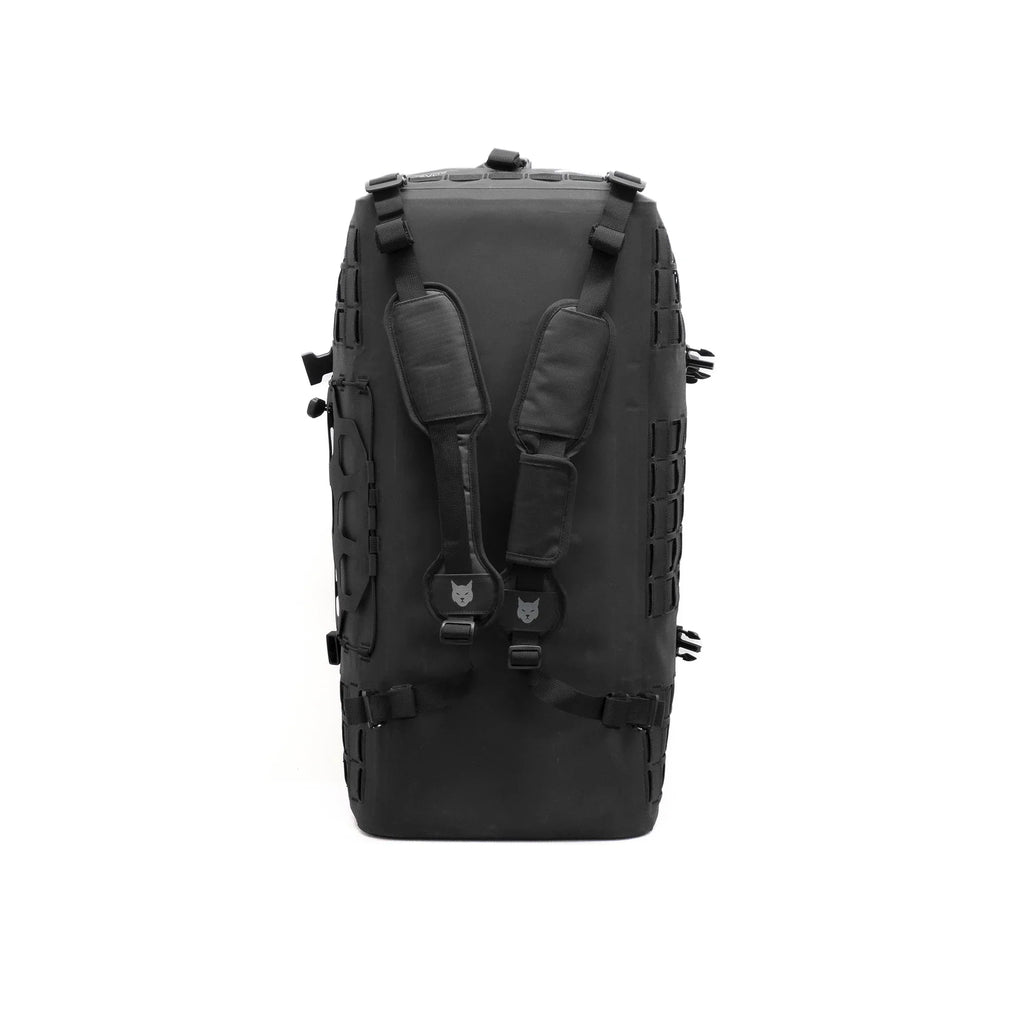 RYZVOX FAR Duffel Bag 40L standing upright with the backpack straps fitted, seen from the rear