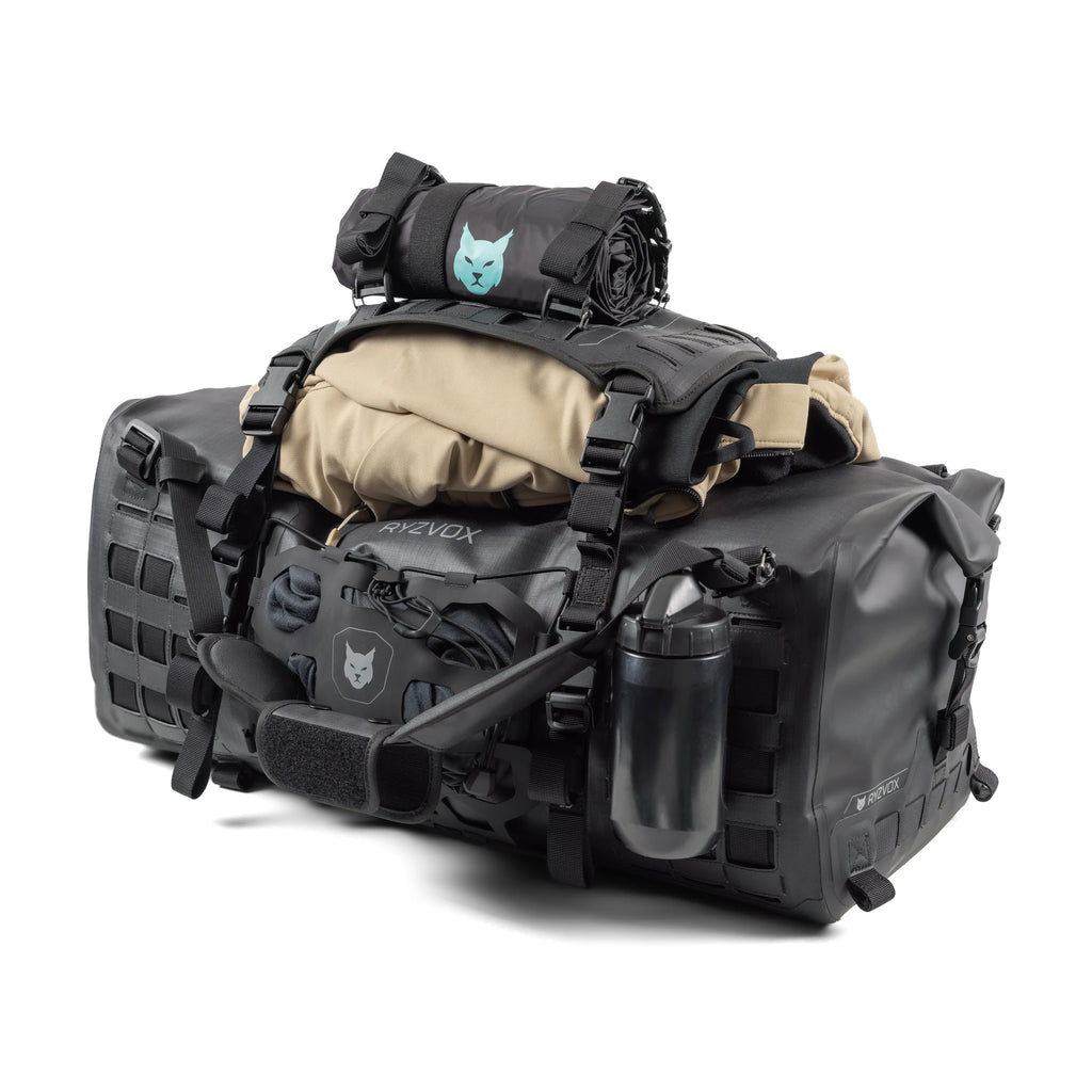 RYZVOX FAR Duffel Bag 40L Moto packed with a sleeping mat, bottle holder and tent poles