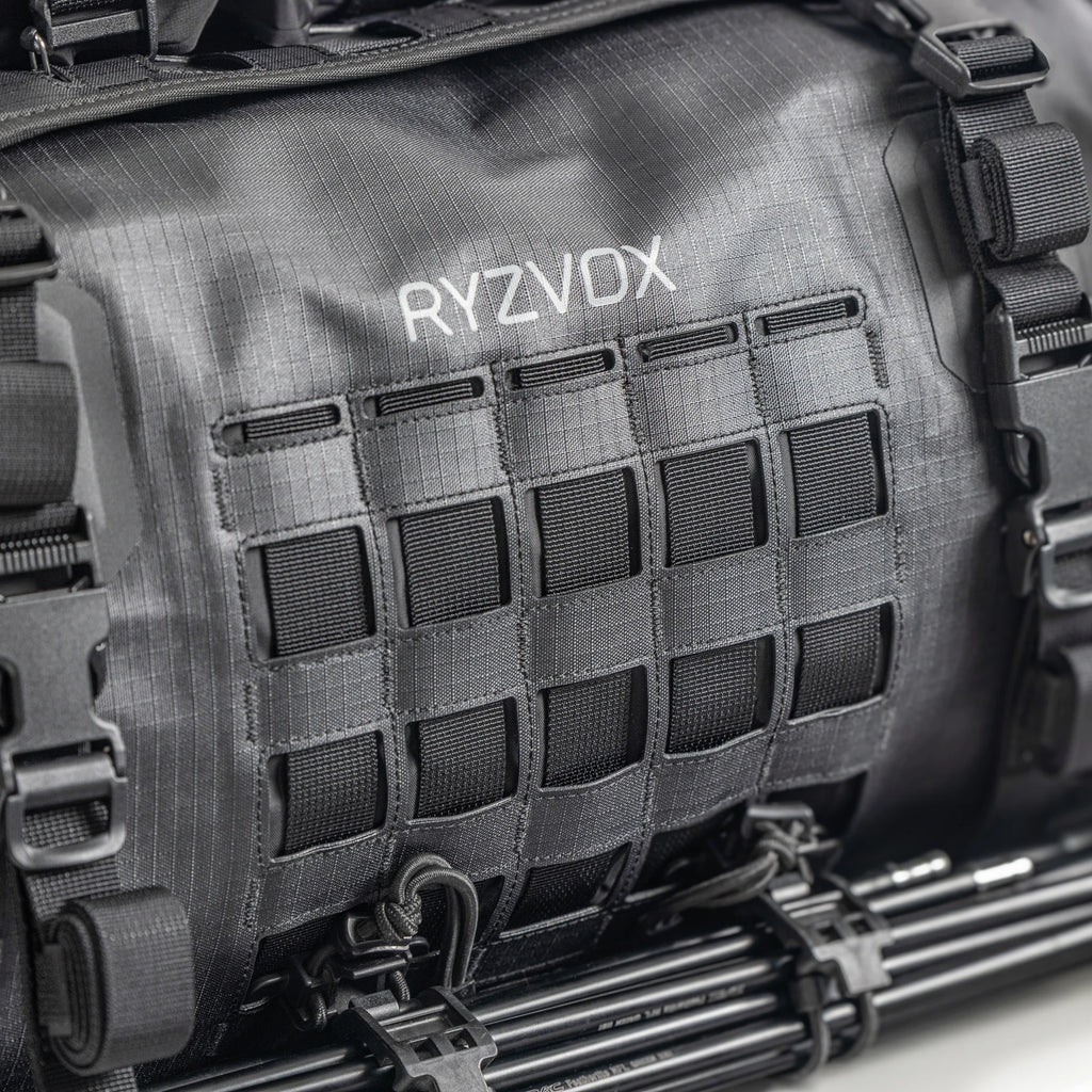 Close up of the laser cut attachment grid and the RYZVOX wordmark