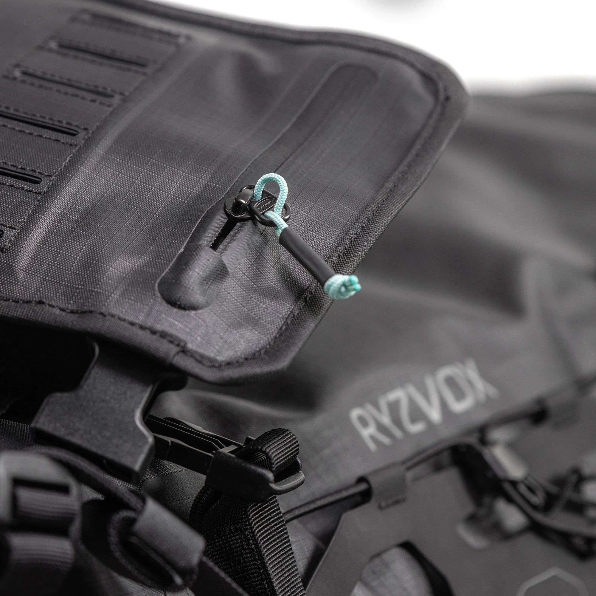 Close up of the zipped pocket with a pull tab