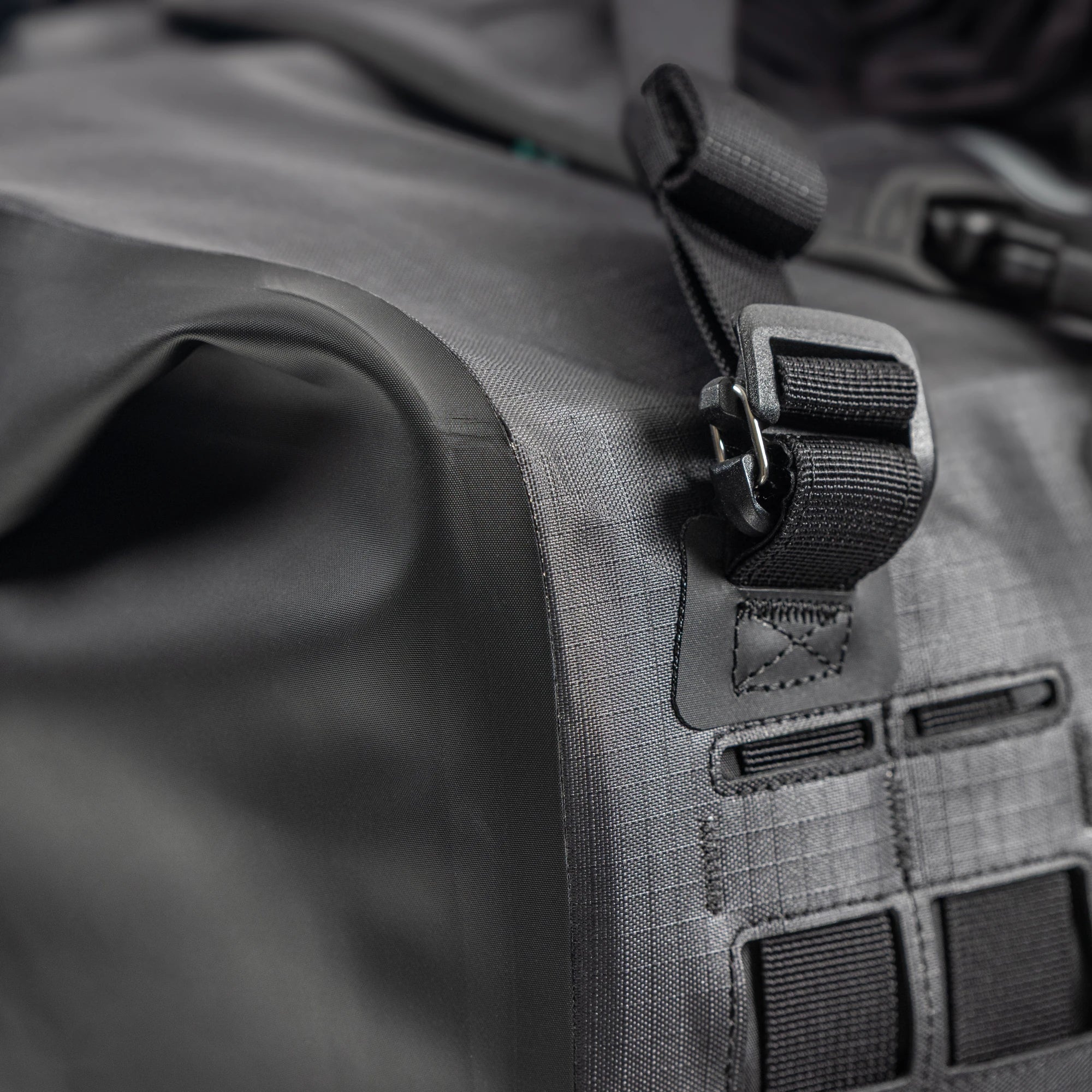 Close up of a reinforced corner and a strap attachment point