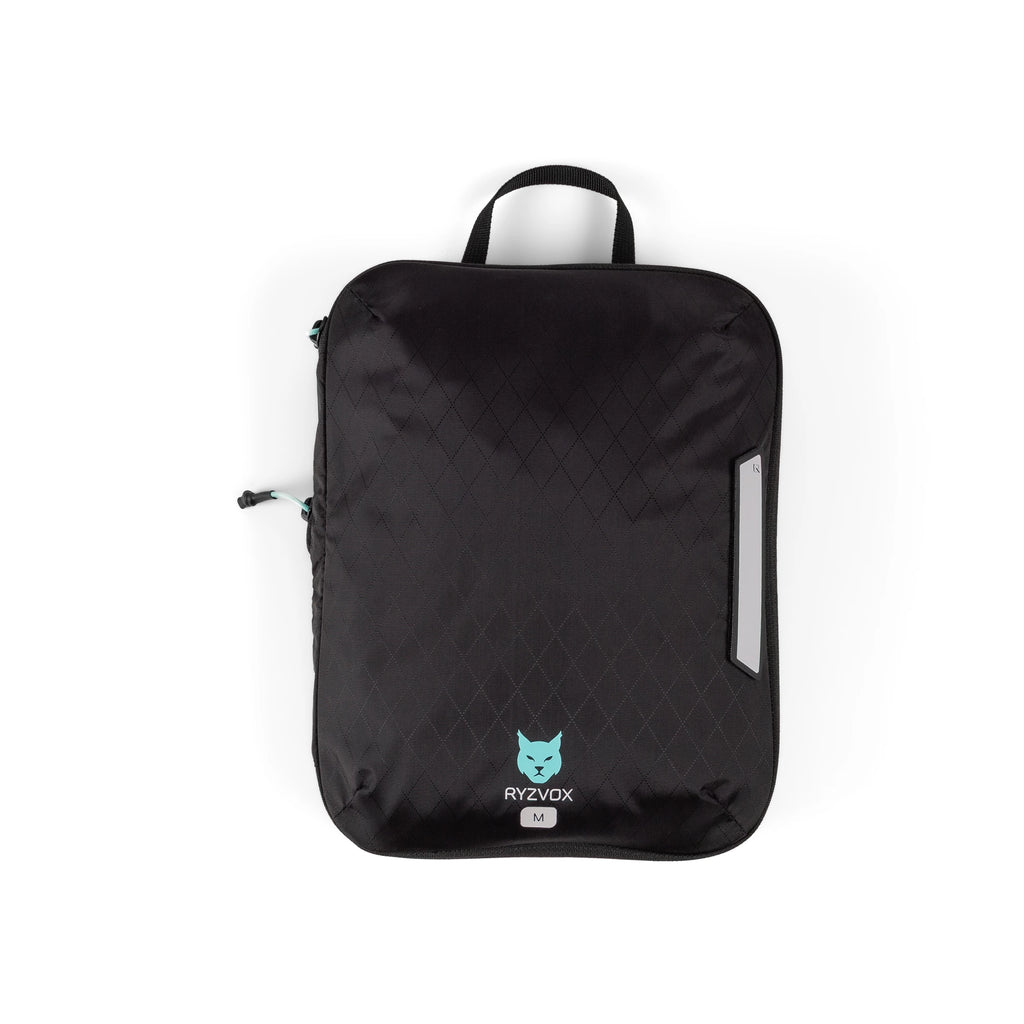 RYZVOX Packing Cube M empty and flat, front panel with the carry loop and label