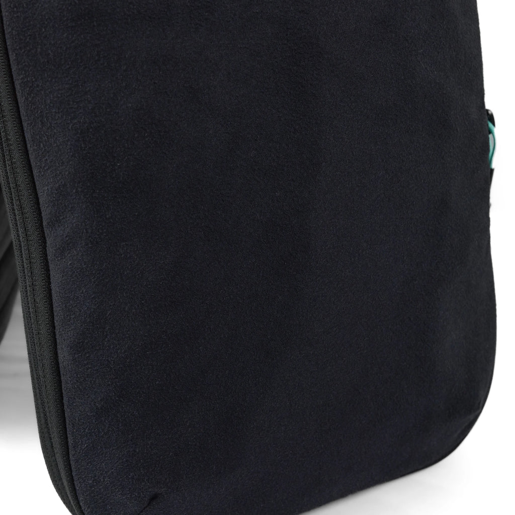 Close view of the zip and seam along the edge of the RYZVOX Packing Cube M
