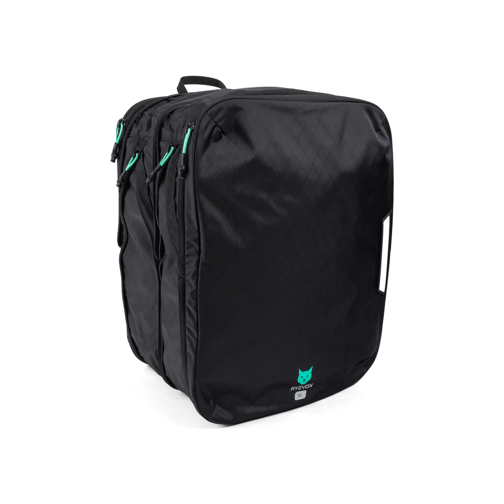 RYZVOX Packing Cube XL packed and standing upright, showing the zip pulls on top