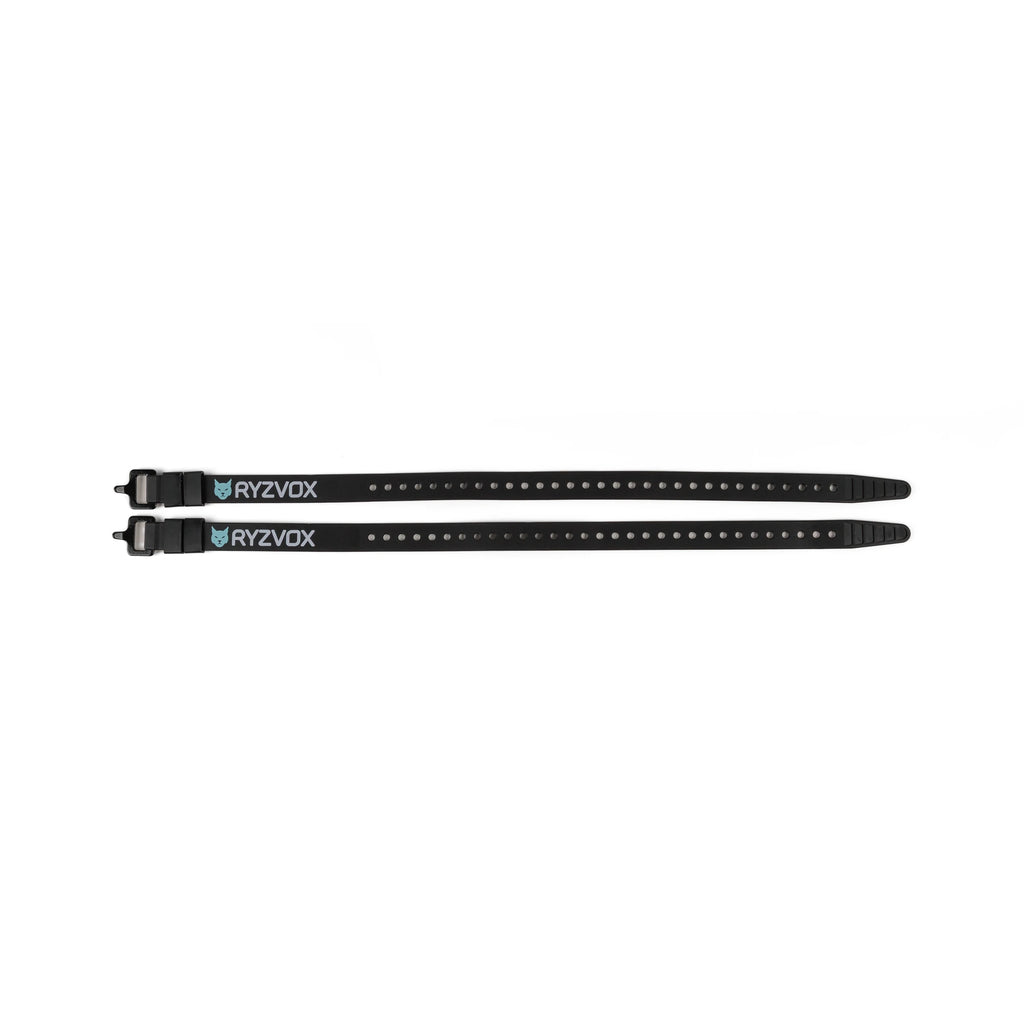 Pair of RYZVOX Utility Straps 53 laid flat, showing the ladder holes and buckle ends
